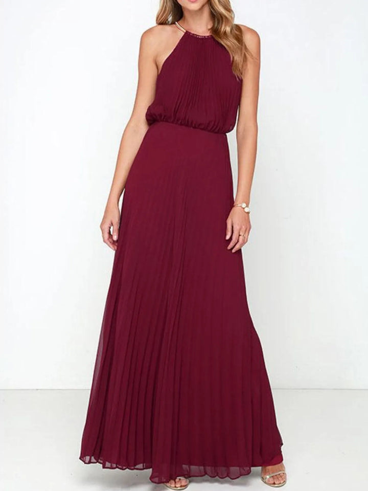 Burgundy halter neck gown on a white background