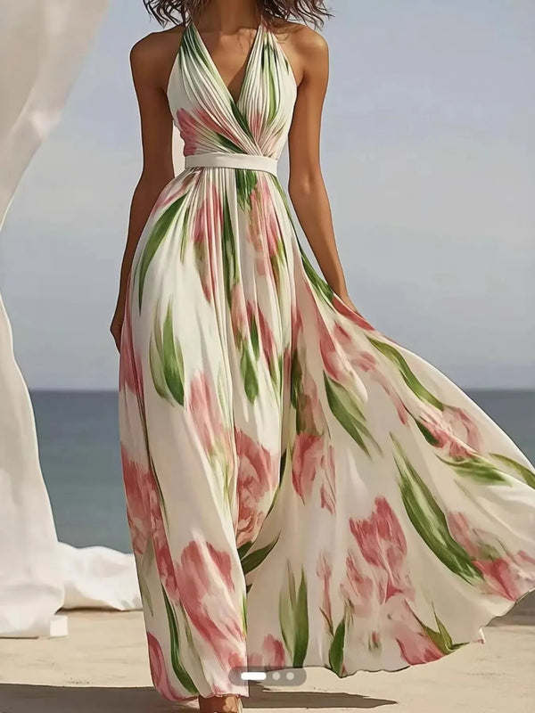 Woman wearing a floral maxi dress on a beach