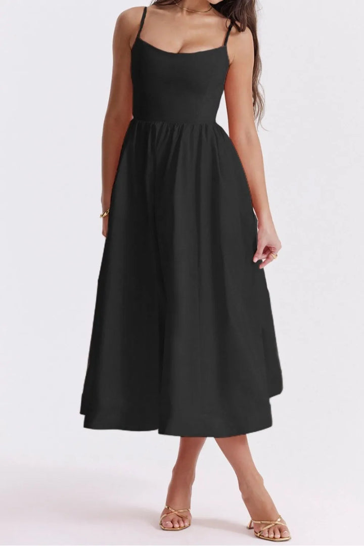 Black dress worn by a person on a white background
