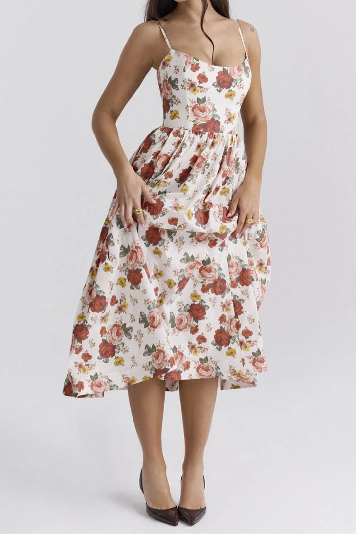 Woman wearing a floral dress on a white background