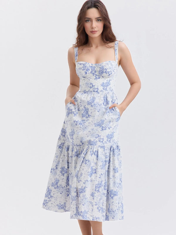 Woman wearing a floral dress on a white background