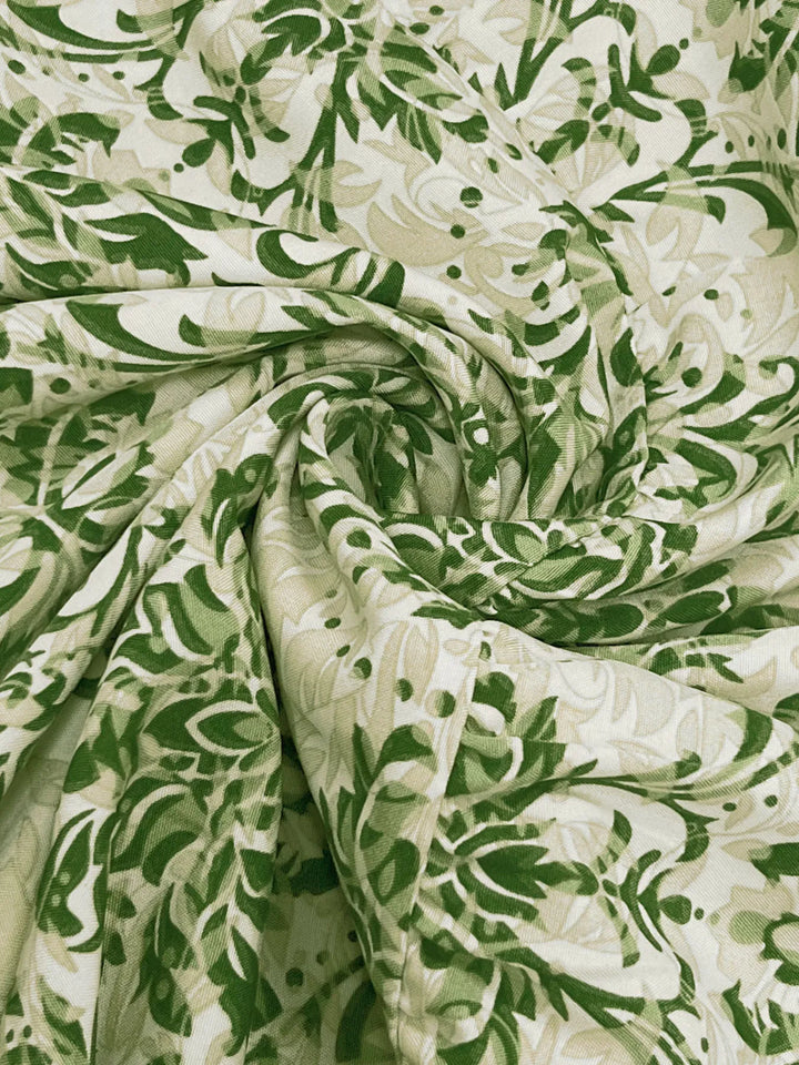 Green and white floral patterned fabric